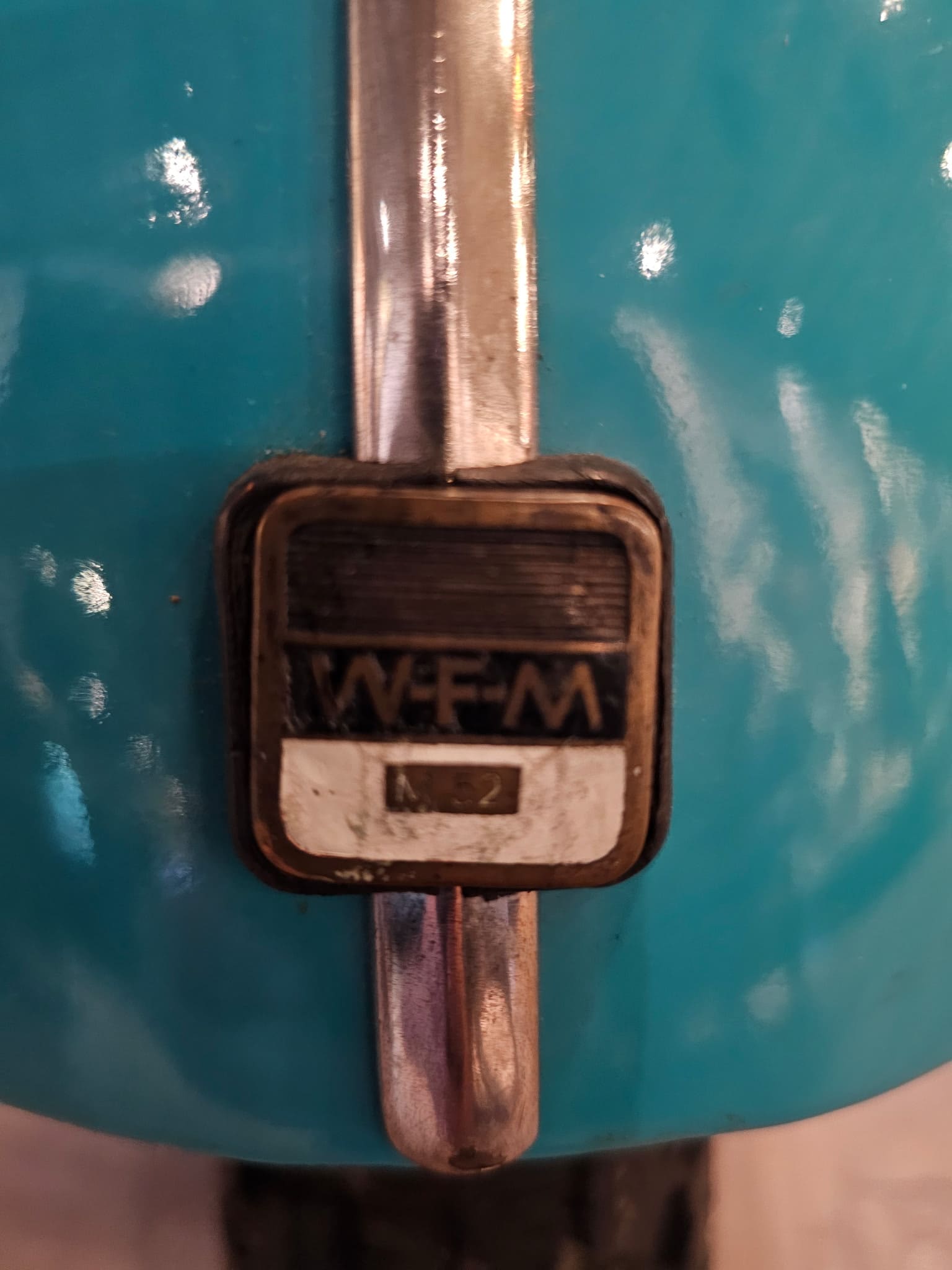 WFM M-52 model badge on the front fender