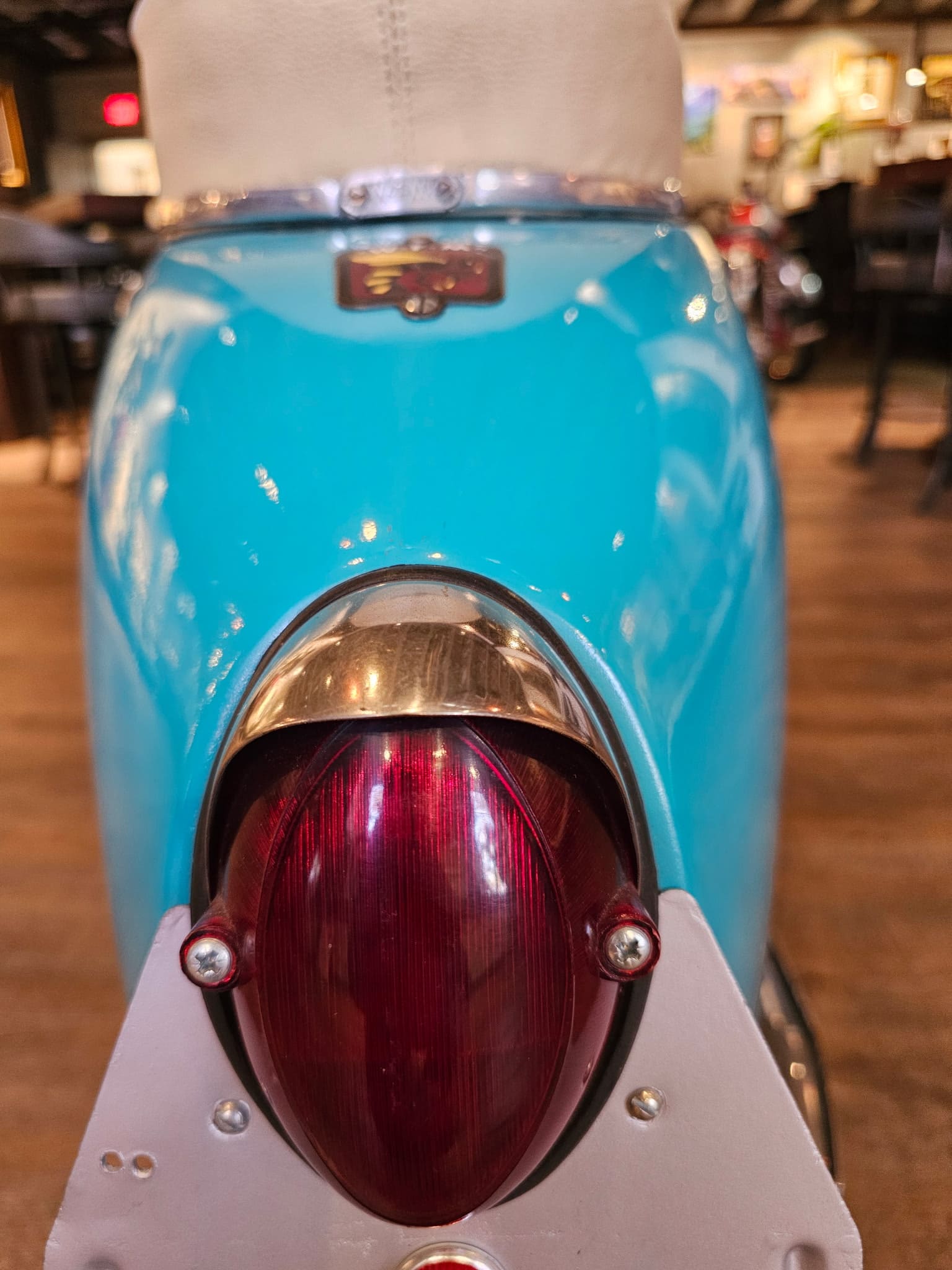 Teardrop taillight and rear badge